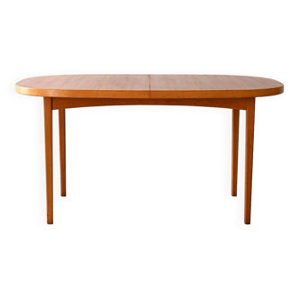 Teak dining table with round corners