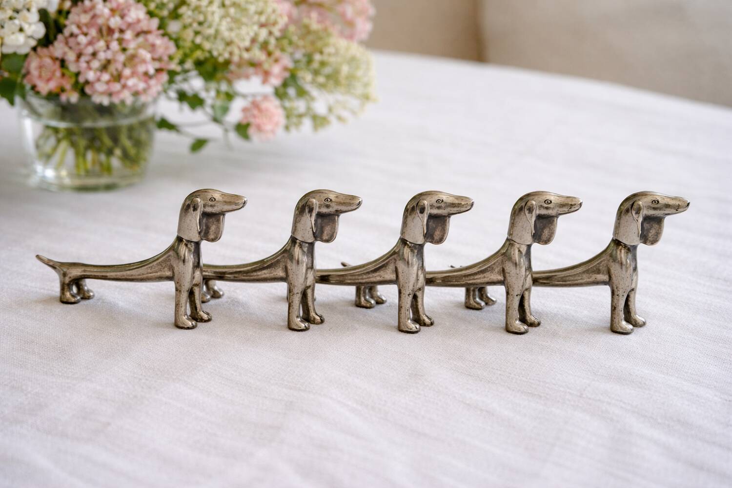 Vintage silver-plated dog knife rests