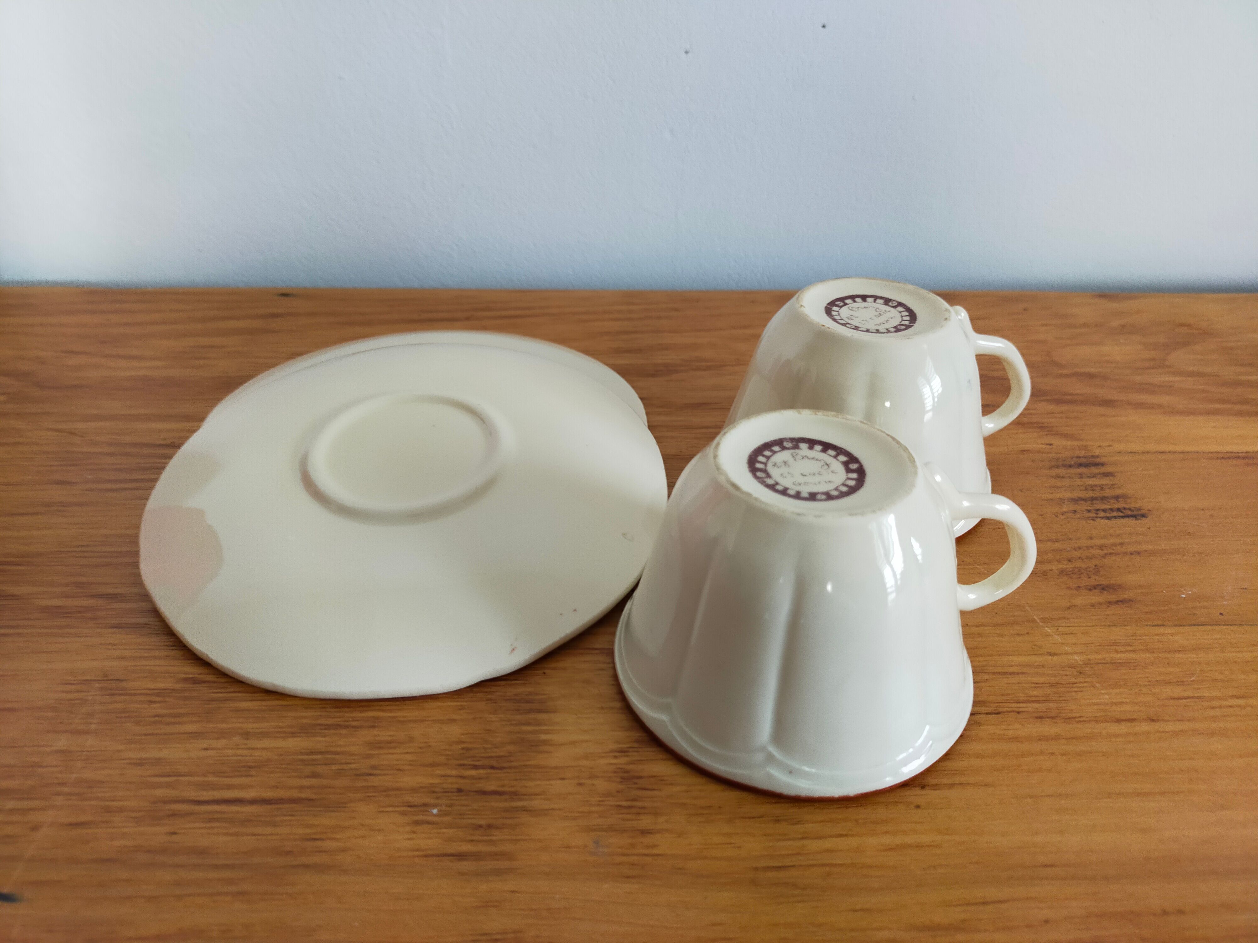Vintage saucer cups in Breton earthenware