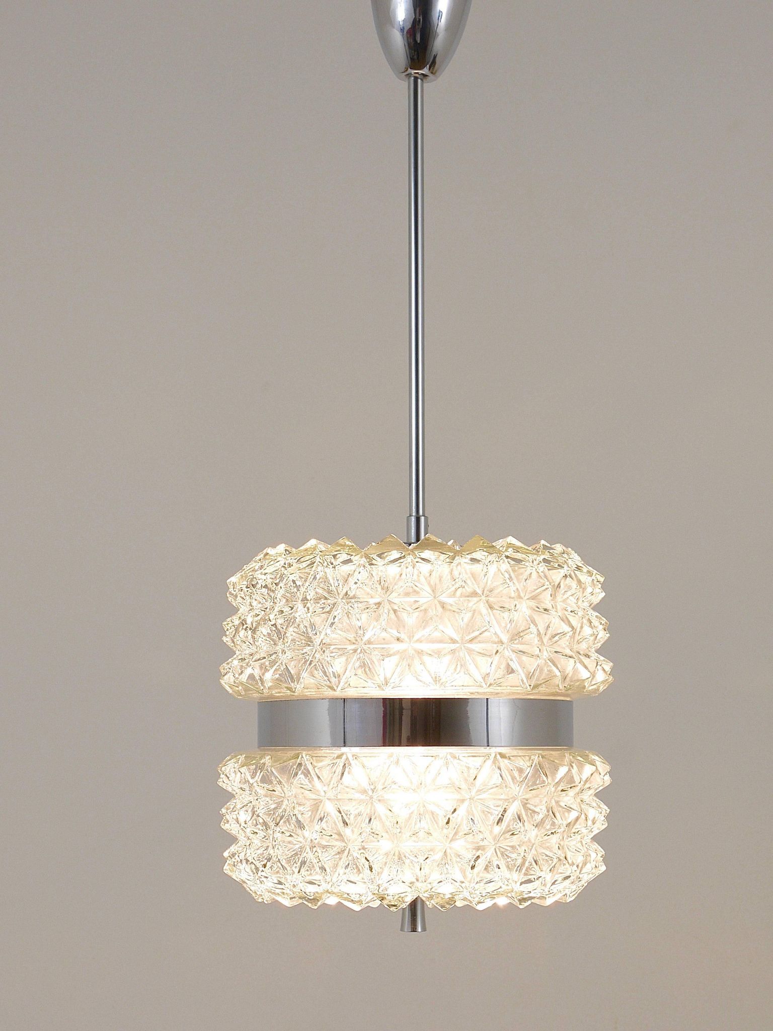 Faceted glass suspension light in chrome style by Karl Fagerlund from the 1960s.
