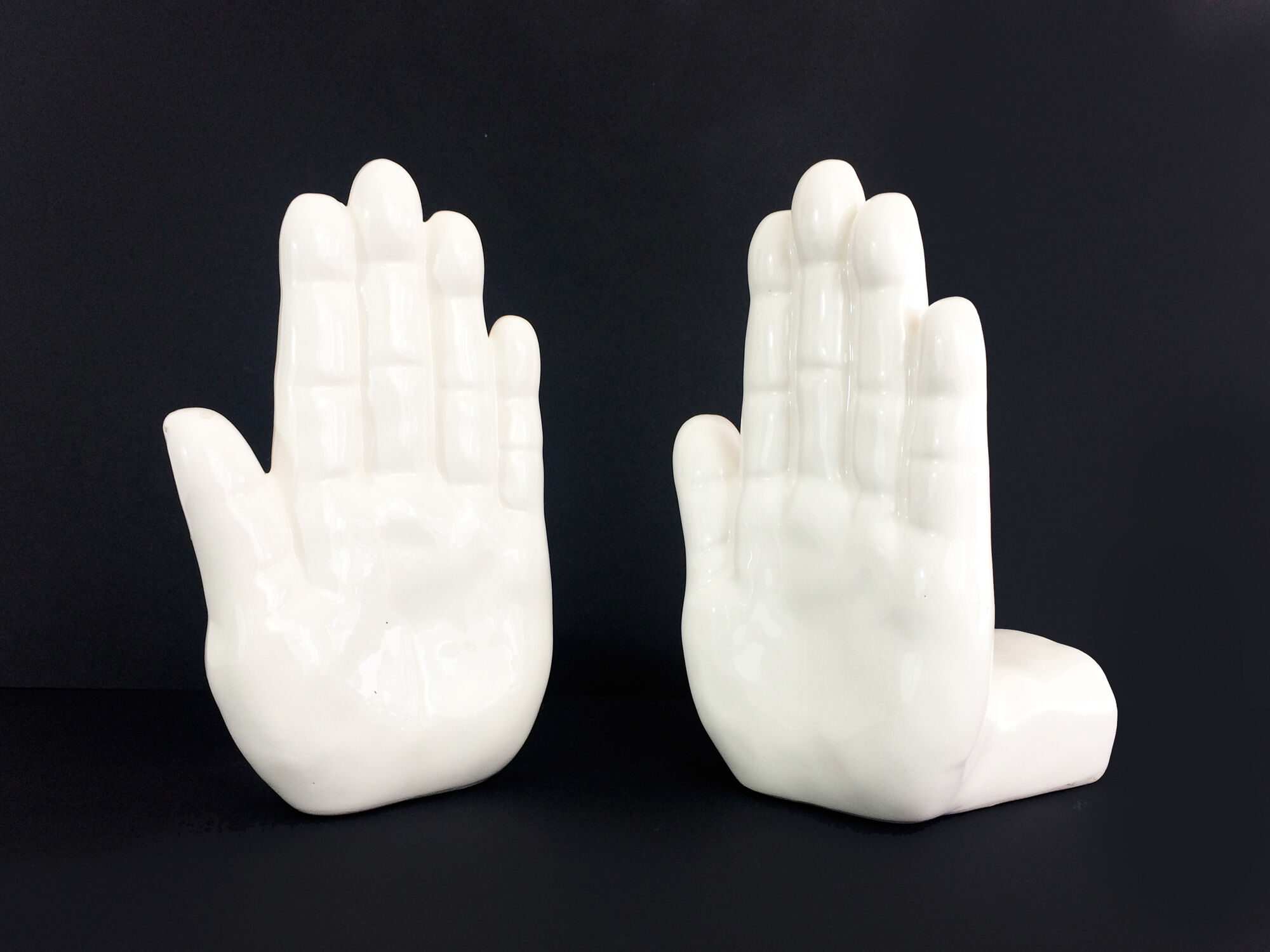 Pair of vintage handends in white ceramic to be used to comfort. Year 80