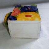Ceramic vase pitcher decorated with flowers