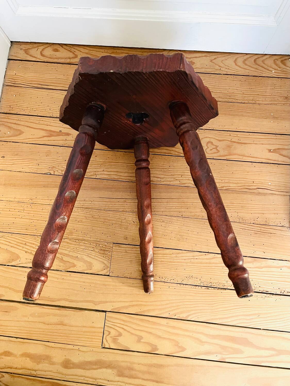 Vintage wooden tripod stool with turned legs