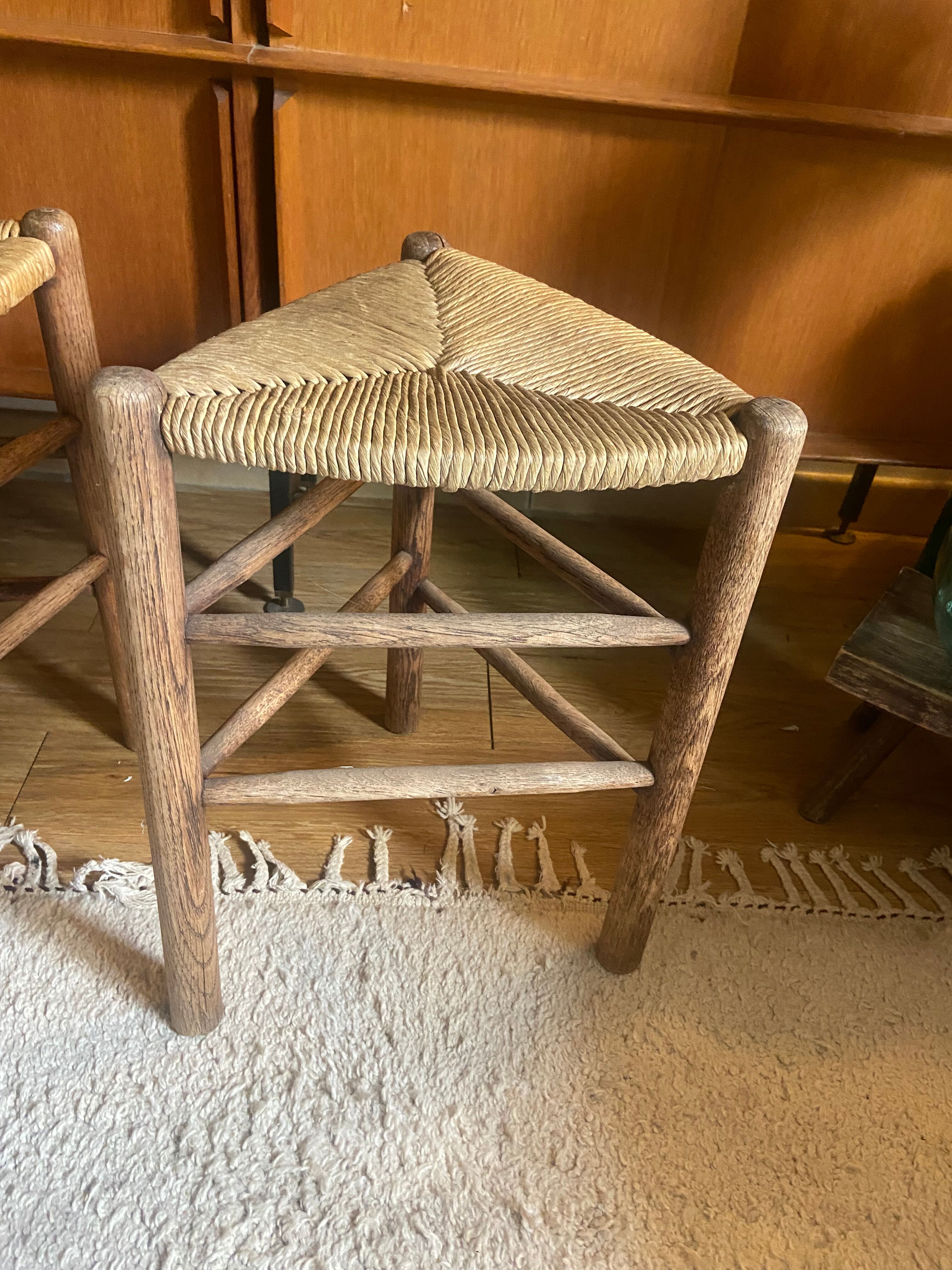 Pair of vintage oak tripod stools