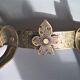 Applies two fires and fleur-de-lys in hammered wrought iron and patina in the old way in the medieval taste