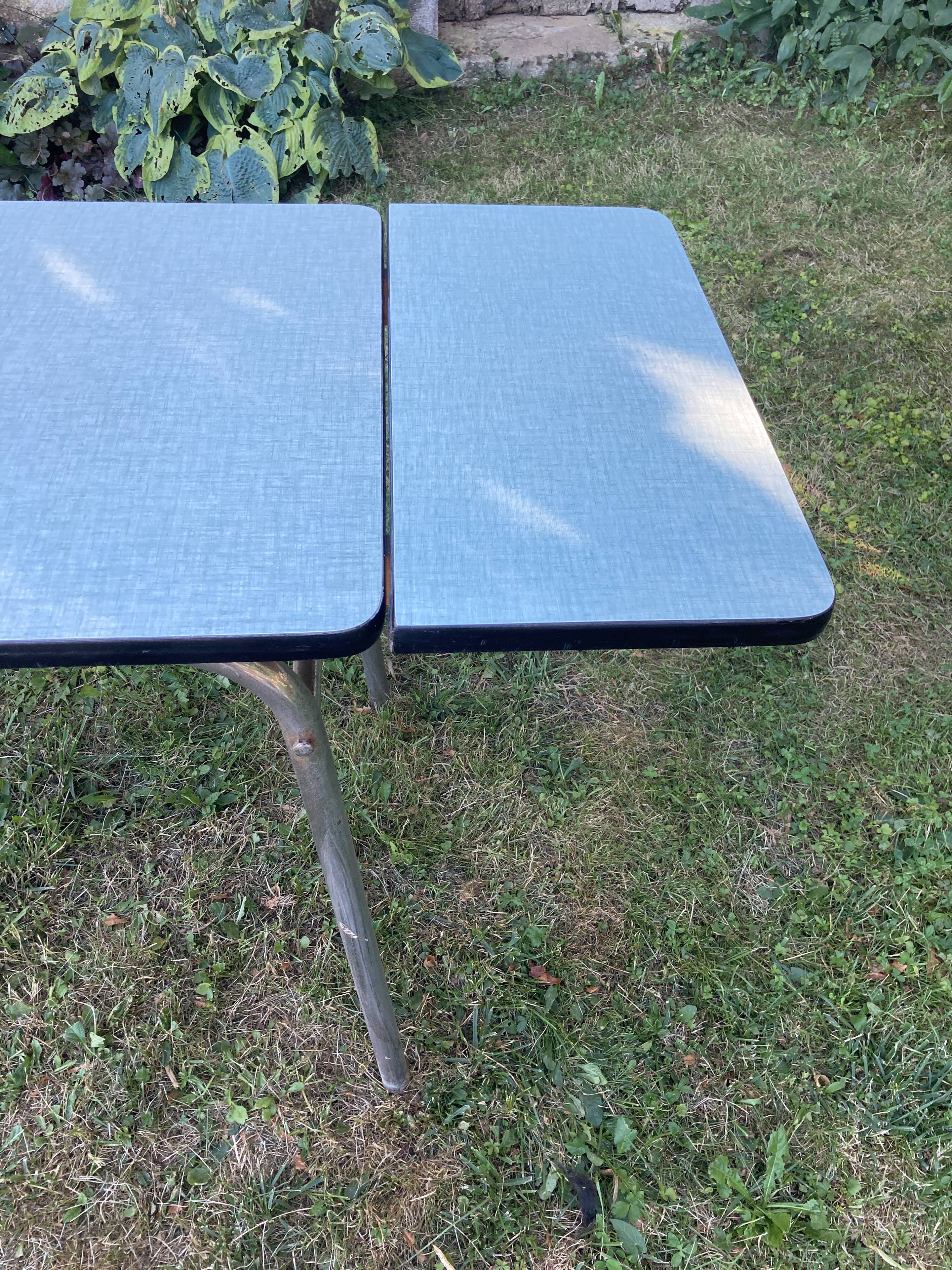 Blue formica table with extensions