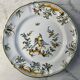 Assiette en faïence de Moustiers décor oiseau et fleurs 25cm