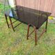 Smoked glass desk on rattan legs and leather detail