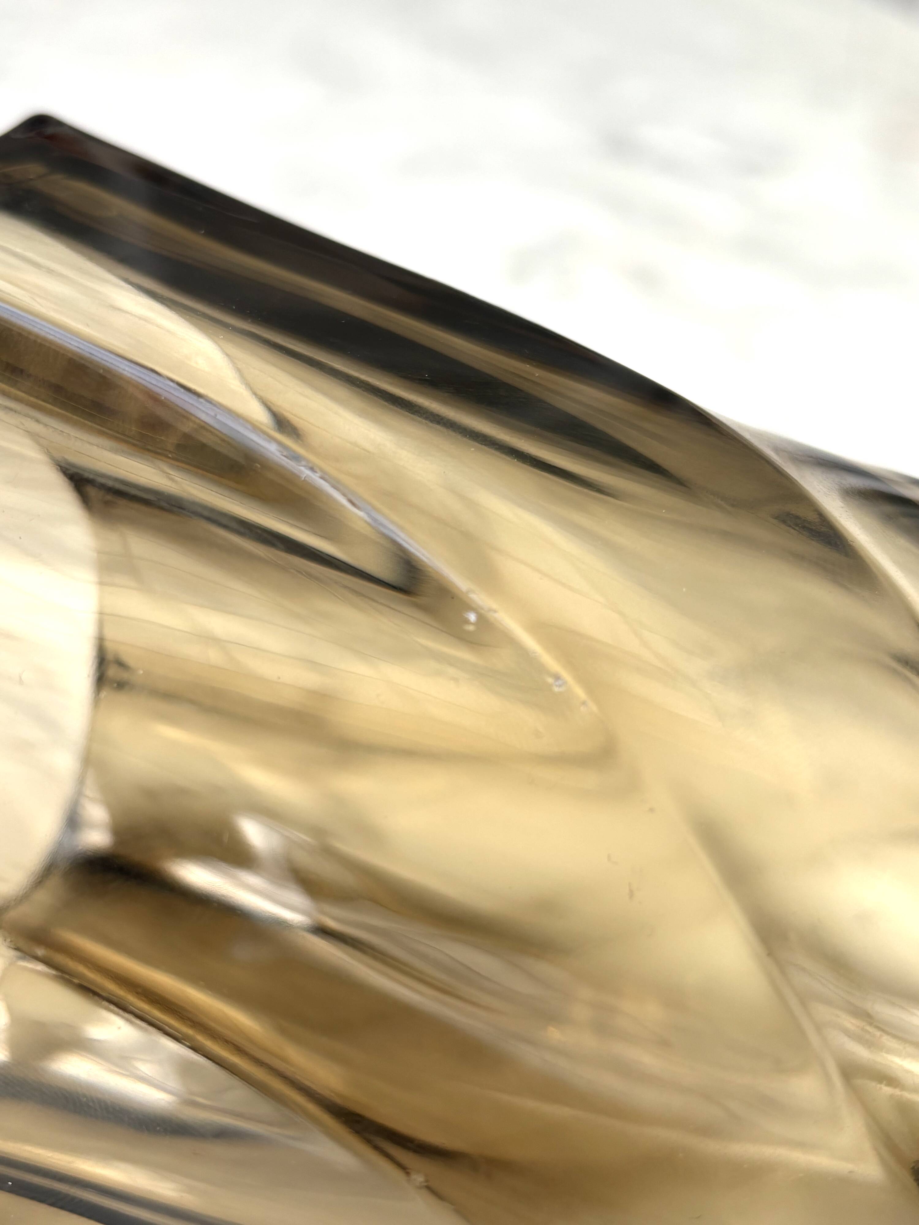 Small translucent dark brown twisted glass vase