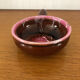 Brown and pink glazed terracotta caquelon