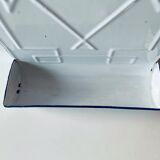 Old enamelled kitchen utensil display