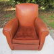 Paire de fauteuils club en cuir