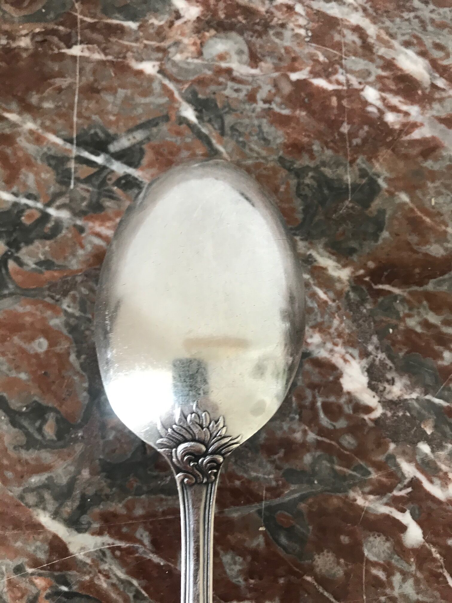 Set of 7 tablespoons in flowered silver metal with punch
