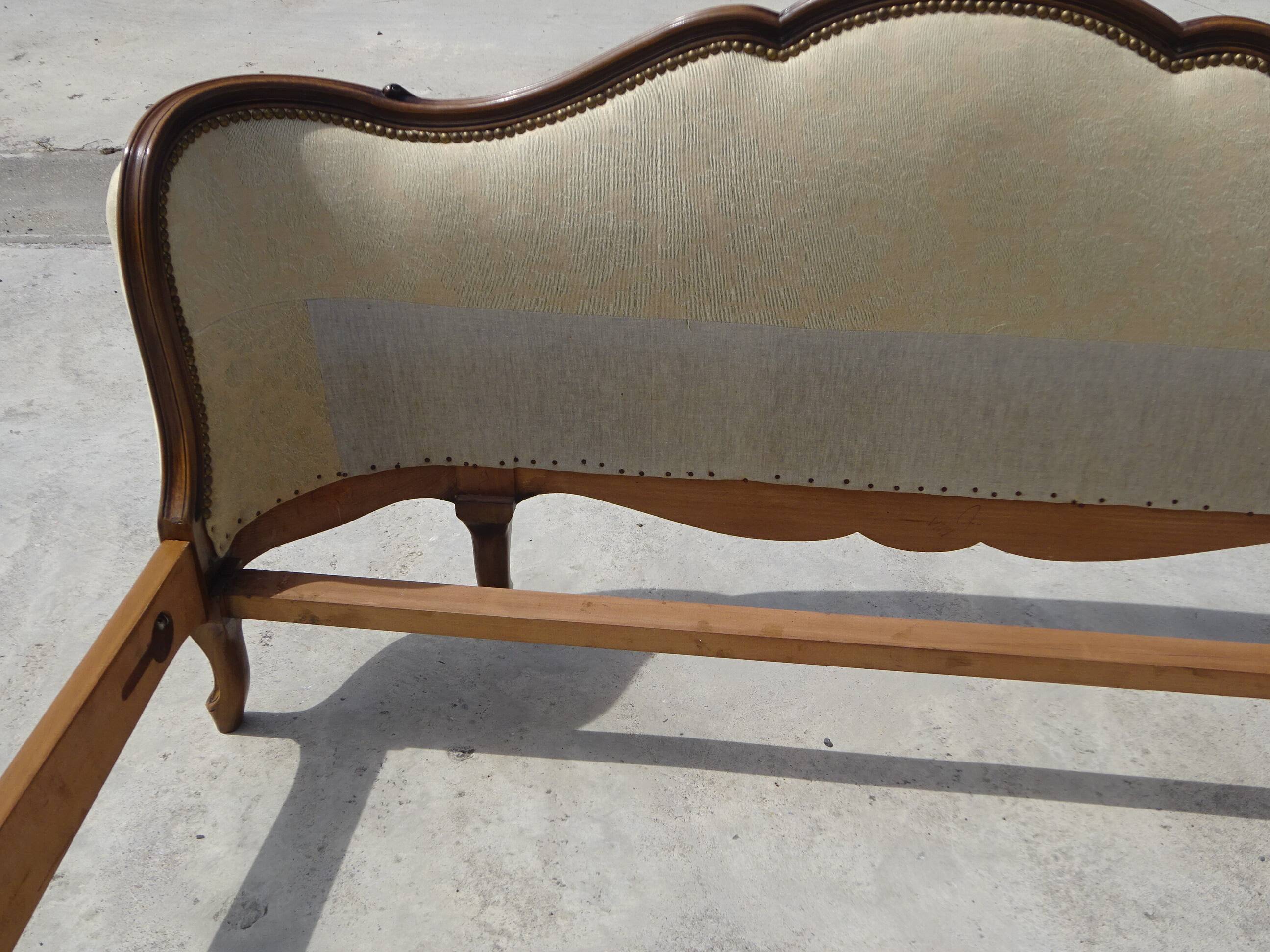 Solid wood bed frame with Jacquard fabric.