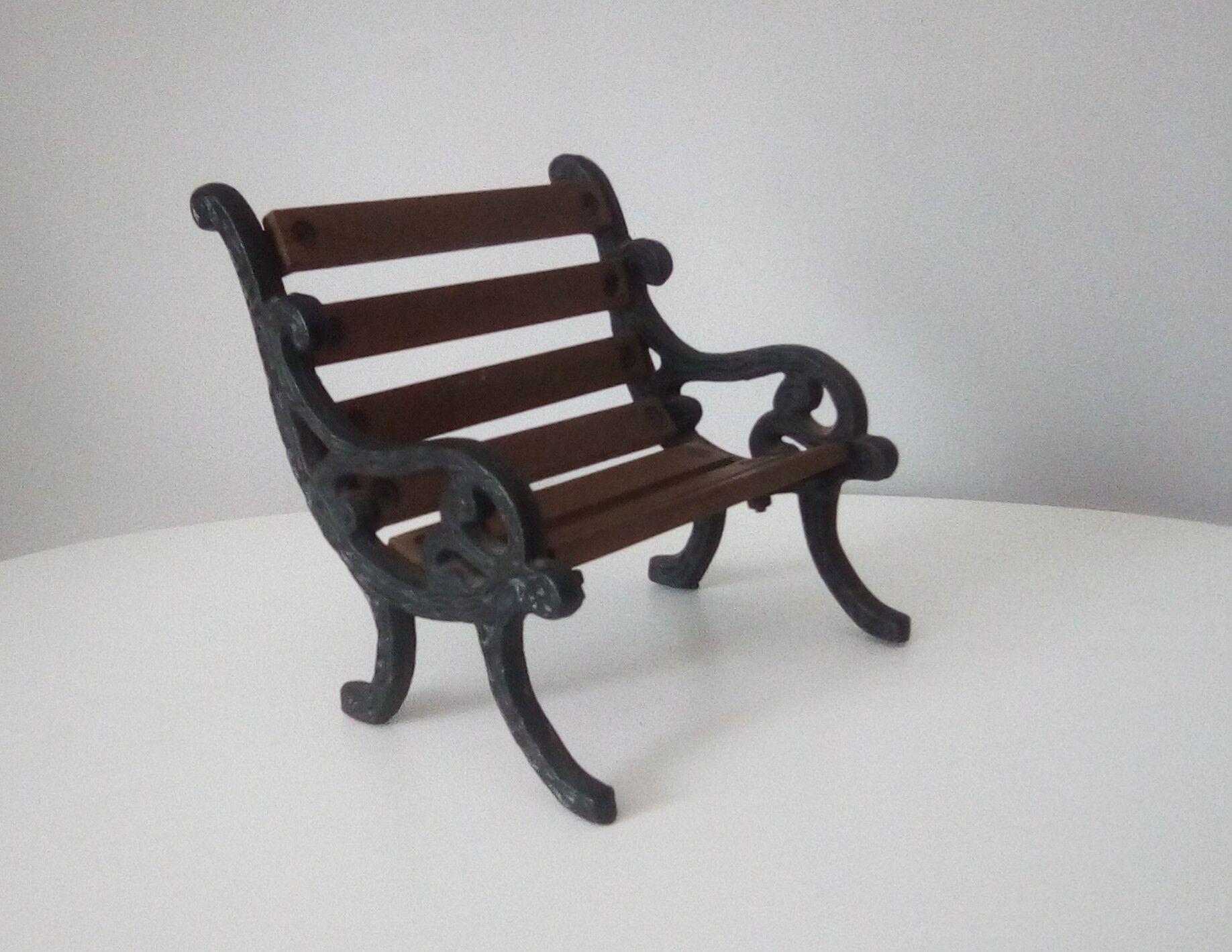 Vintage miniature wooden and wrought iron bench
