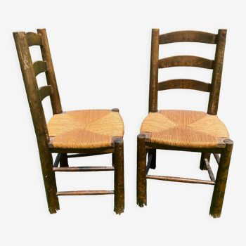 Pair of Georges Robert straw chairs
