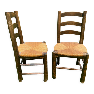 Pair of Georges Robert straw chairs