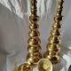 Pair of brass altar candlesticks, mid-20th century