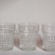 Trio of vintage whiskey glasses in pimpled glass