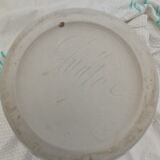 Ceramic vase with sign underneath