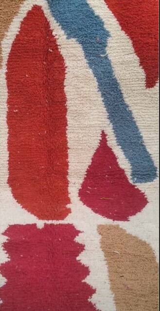 Magnificent handmade Berber rug, adorned with colourful geometric patterns.