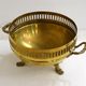 Planter on lion legs, made of golden metal