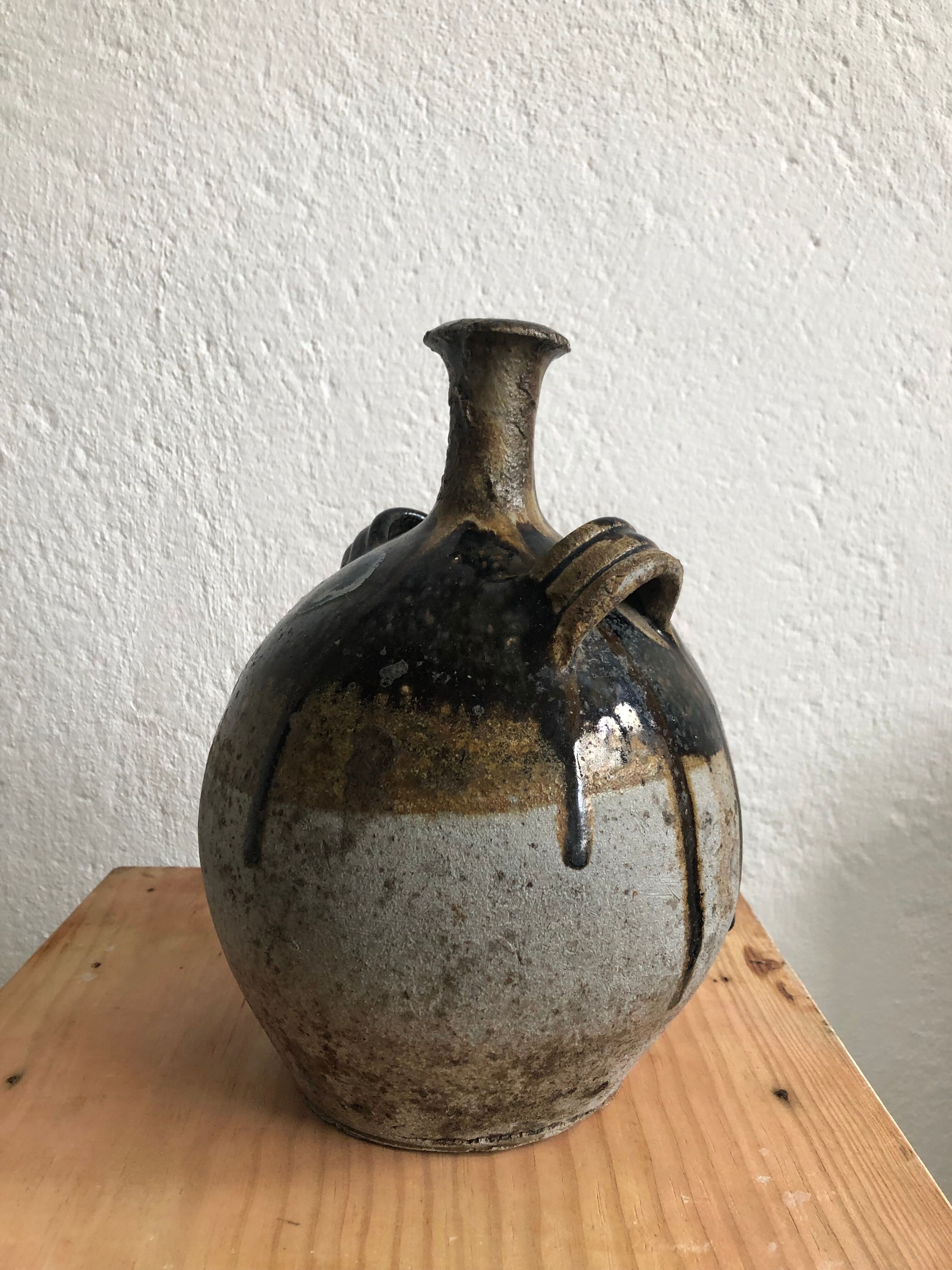 Old glazed terracotta jar