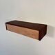 Vintage floating commode in teak and beech wood from the 1960s.