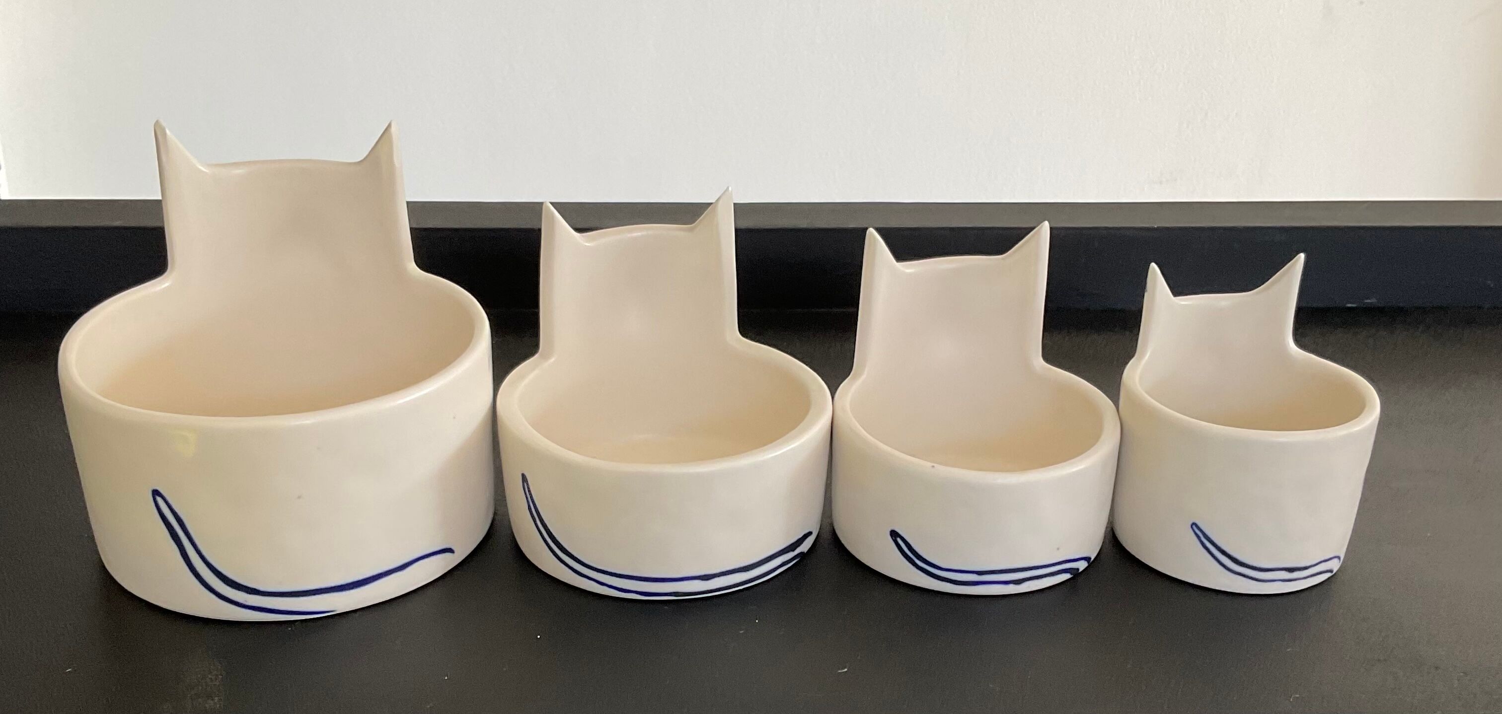 Series of 4 ceramic cat ramekins