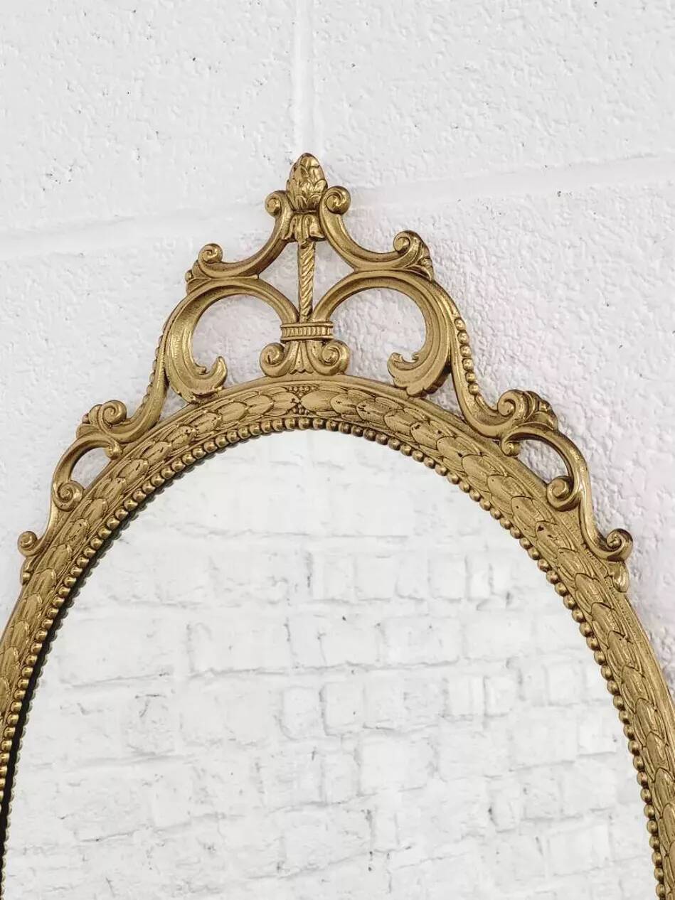 Italian oval brass medallion mirror