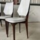 Set de 4 élégantes chaises françaises style scandinave vintage 1960 simili