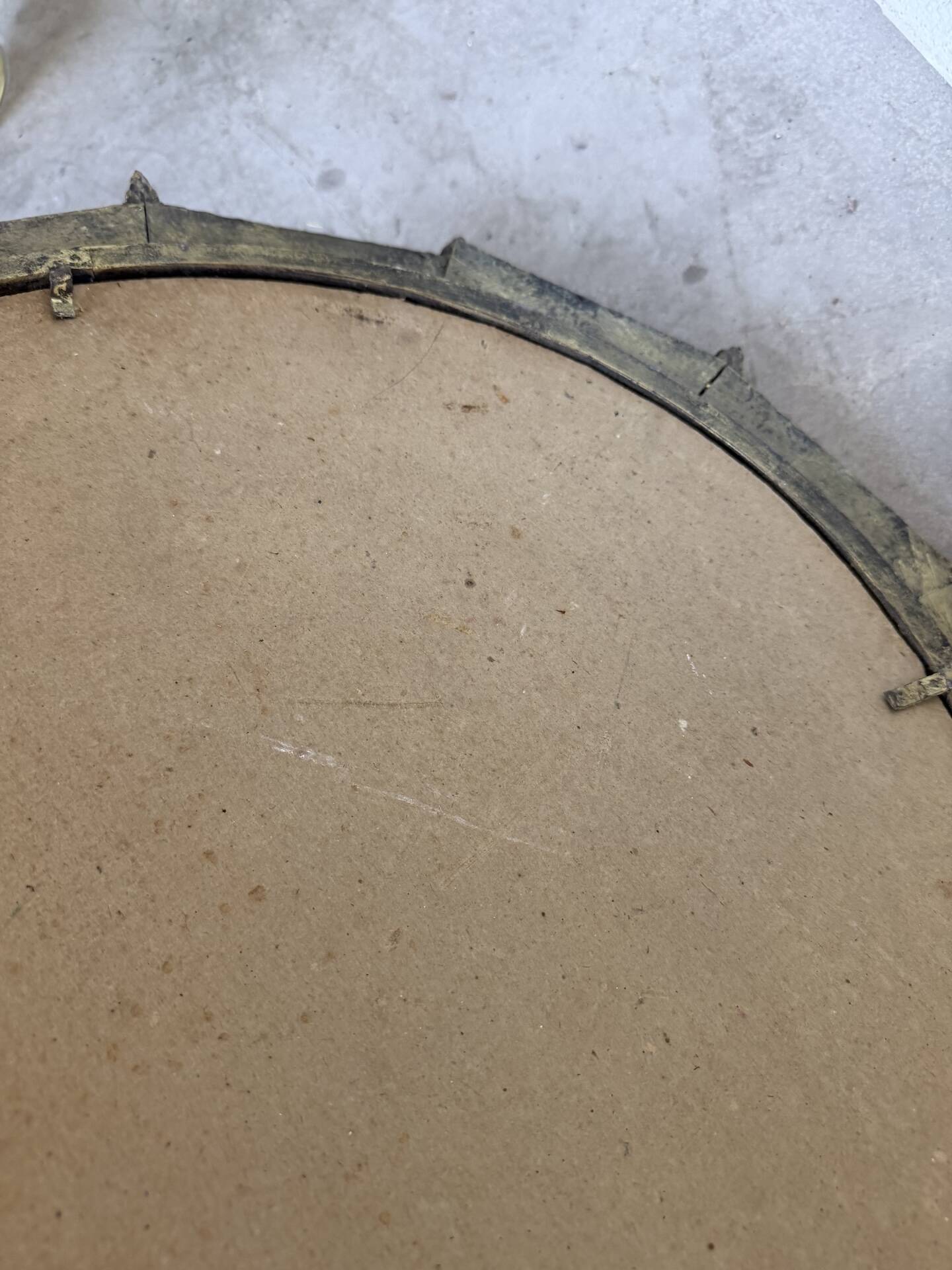 Brutalist round hammered gold metal mirror