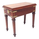 Small old side table with brass finishes