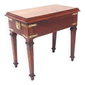 Small old side table with brass finishes