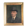 Oil on panel: portrait of man in hat