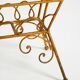 Extraordinary mid-century newspaper and magazine rack with a gilded metal