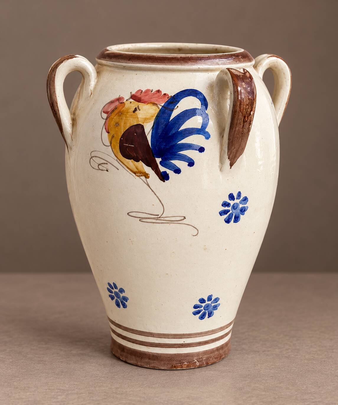 Ceramic vase with four handles from Grottaglie, decorated with a rooster, Apulia.