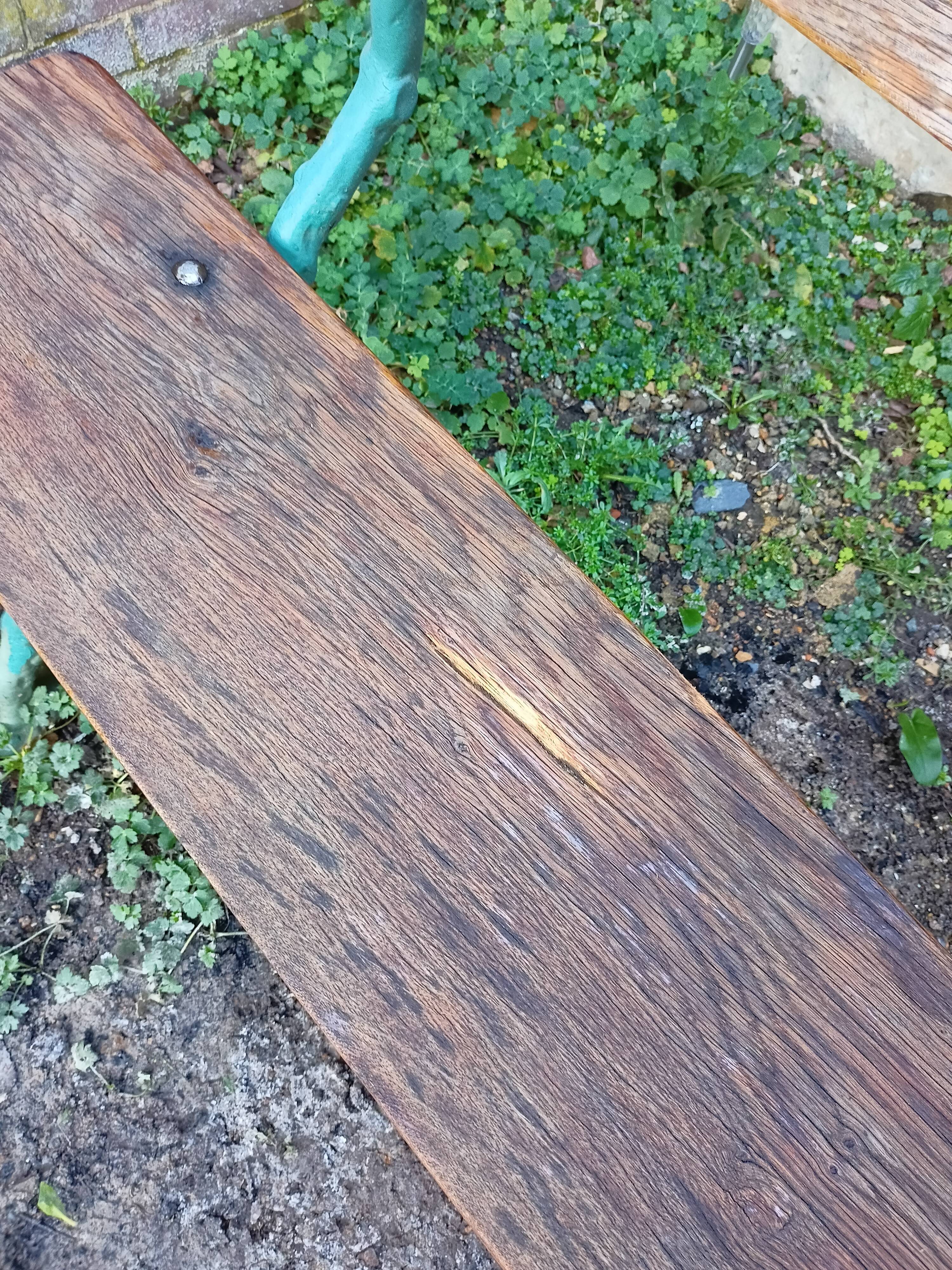 Green wood cast iron garden bench