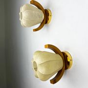 Pair of pear-shaped "Cocoon" wall sconces, resin and pine wood, Italy, 1970s
