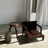 Small low armchair in varnished brown wood