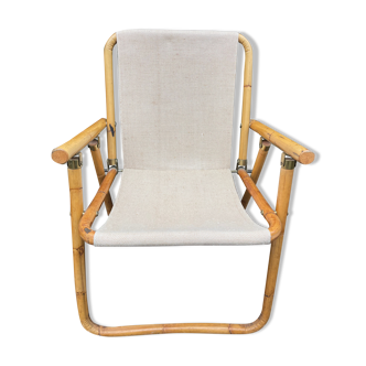 Rattan armchair and foldable canvas