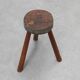 Brutalist French solid oak tripod stool with metal rim, 1850s