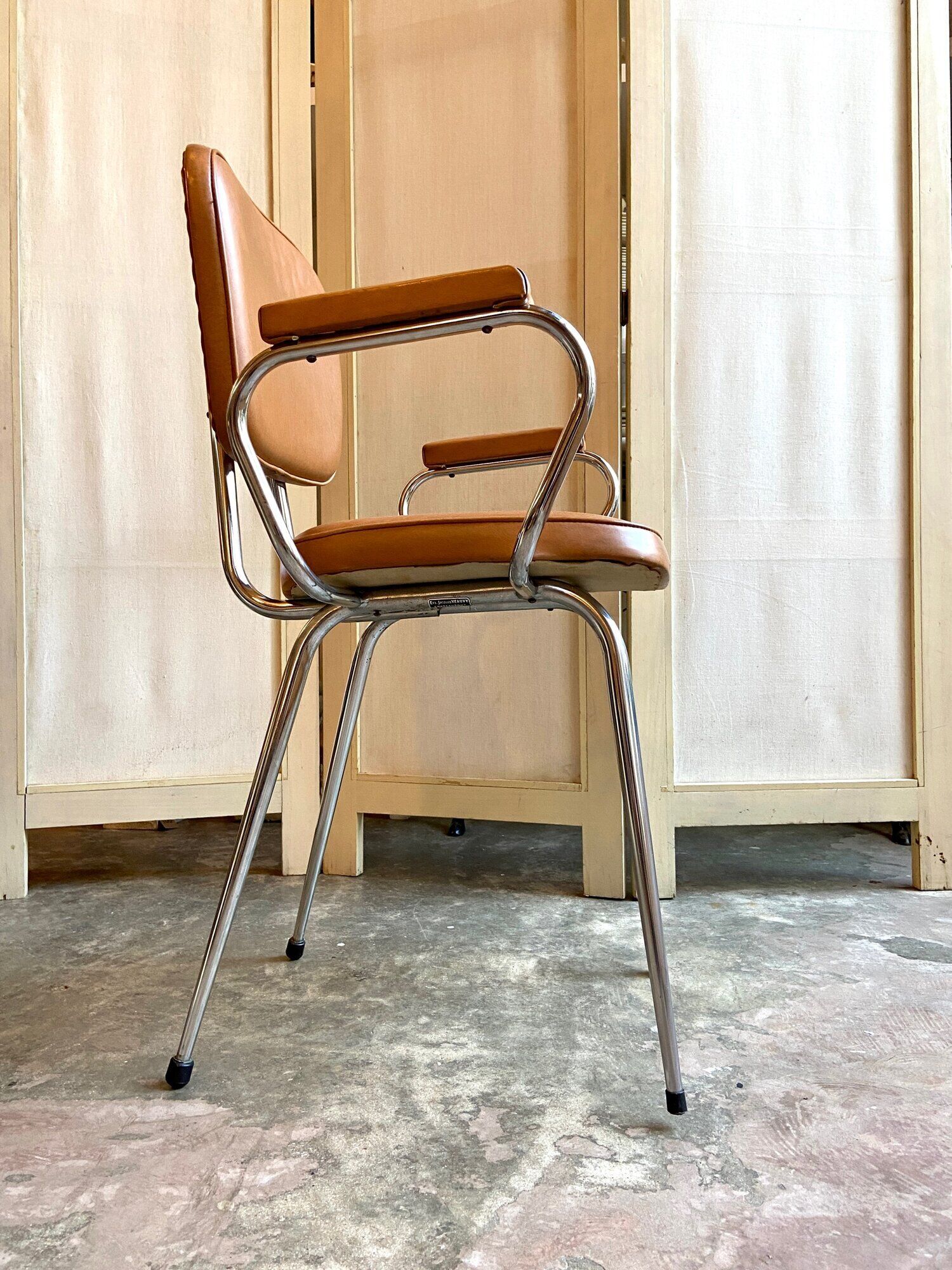 Armchair in chromed metal and tawny skaï 1950s