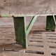Old wooden bench side table grass green