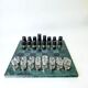 Acrylic & gilt brass chess set with marble board, Italy, 1970s