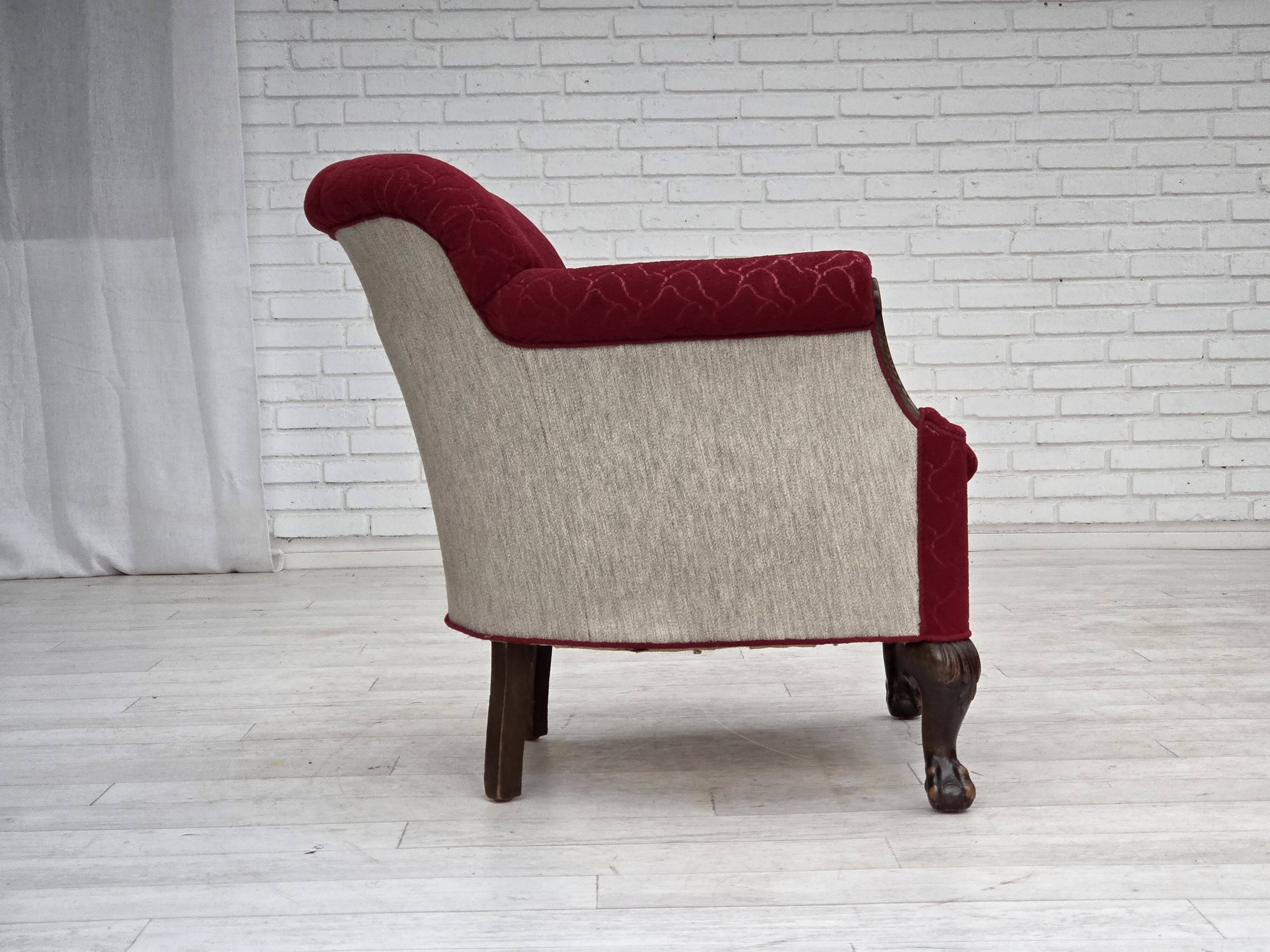 1950s, Danish armchair, red and light grey furniture wool, carved oak wood.