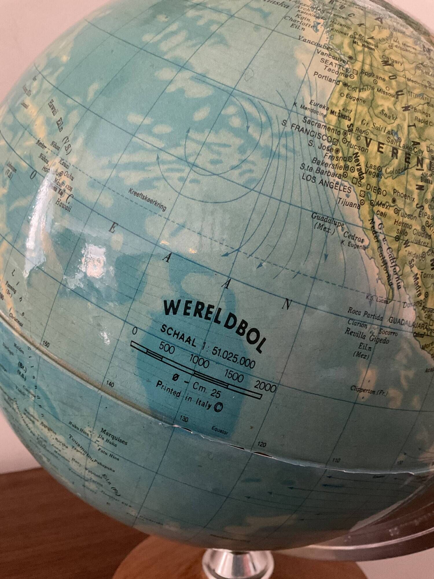 Bright vintage world map with wooden foot