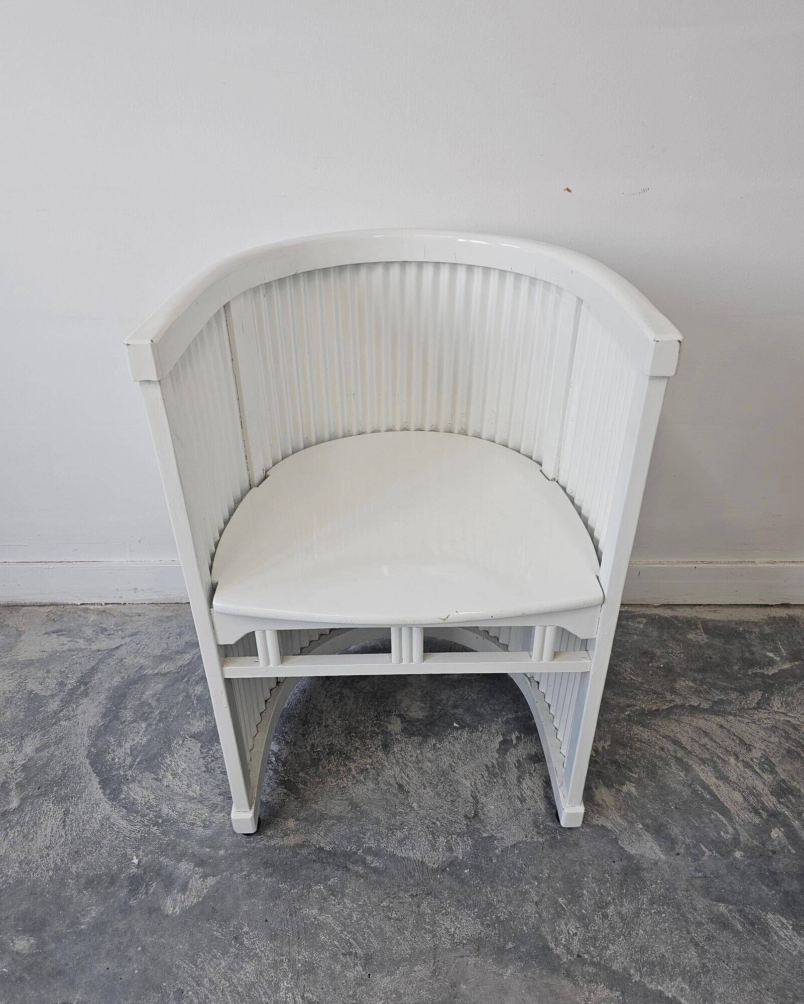Pair of antique horseshoe accent chairs attributed to Hans Gunther Reinstein.