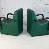 Pair of armrest heaters. Steel and green imitation leather. France, circa 1980