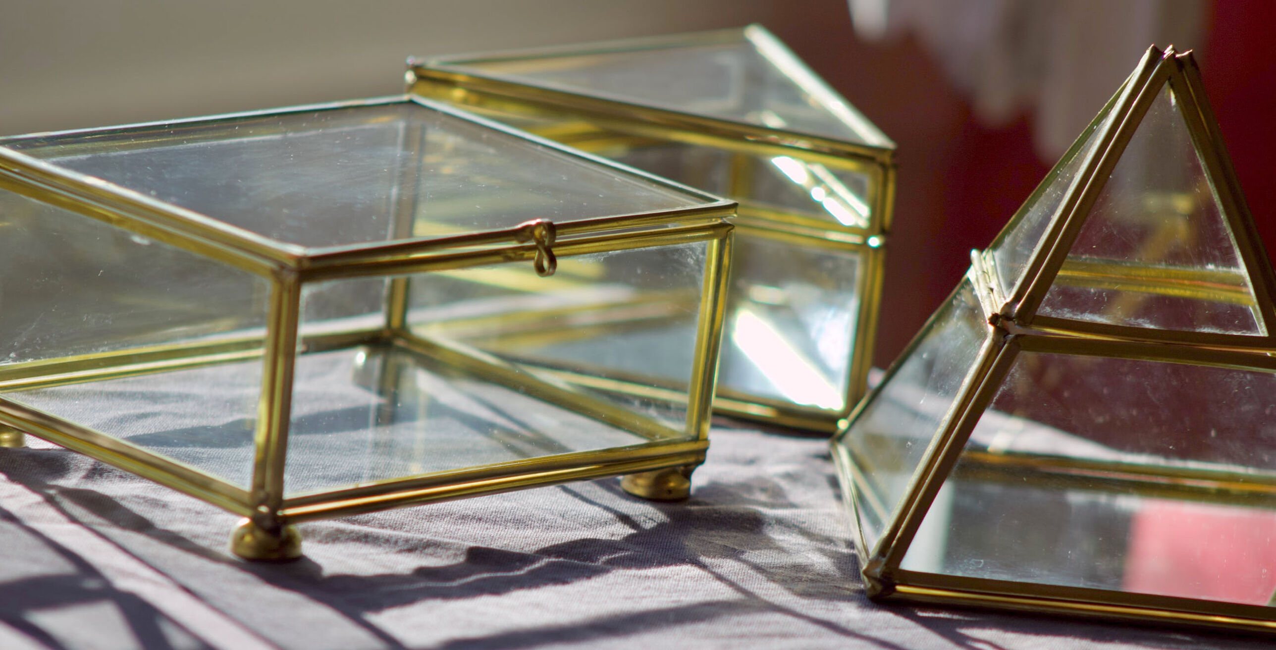 4 old glass, brass and mirror jewellery boxes
